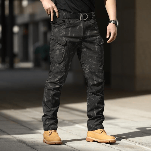 Dark Camouflage IX7 Tactical Spandex Trousers with multiple utility pockets and reinforced seams