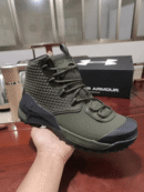 Black & Green Under Armour Hiking Boot with rugged sole and breathable upper